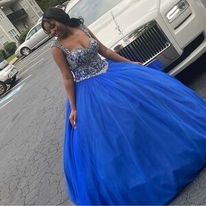 Royal in color and stunning with crown and jewelry